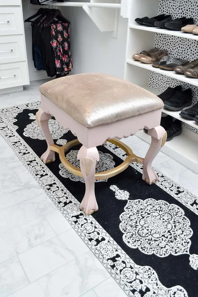 Master Closet With White Ottoman and Patterned Rug - Soul & Lane