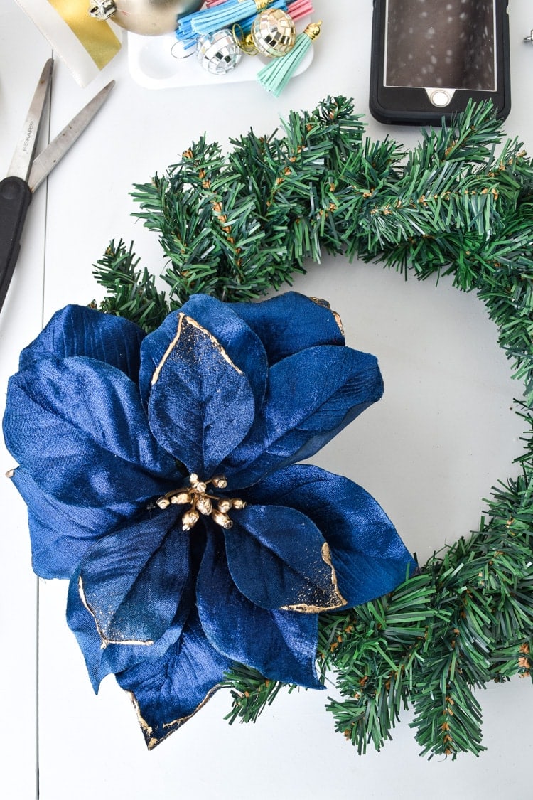 How to attach flower to wreath form