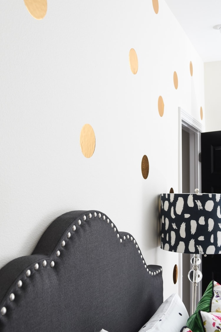 Polka dot accent wall guest room