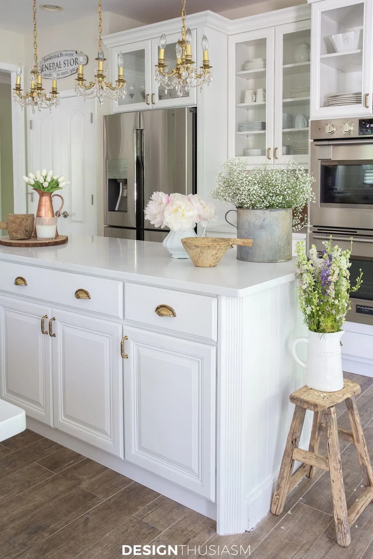vintage french chandeliers over a kitchen island