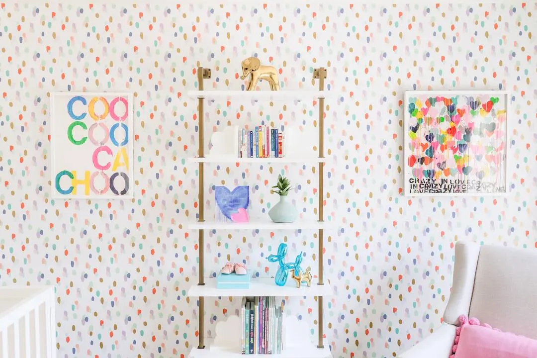 colorful nursery with wall shelves