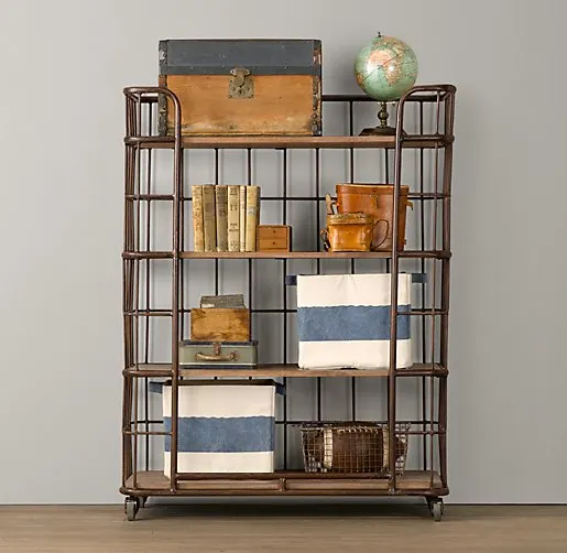 bakers rack used for storage in a kids room with decor 